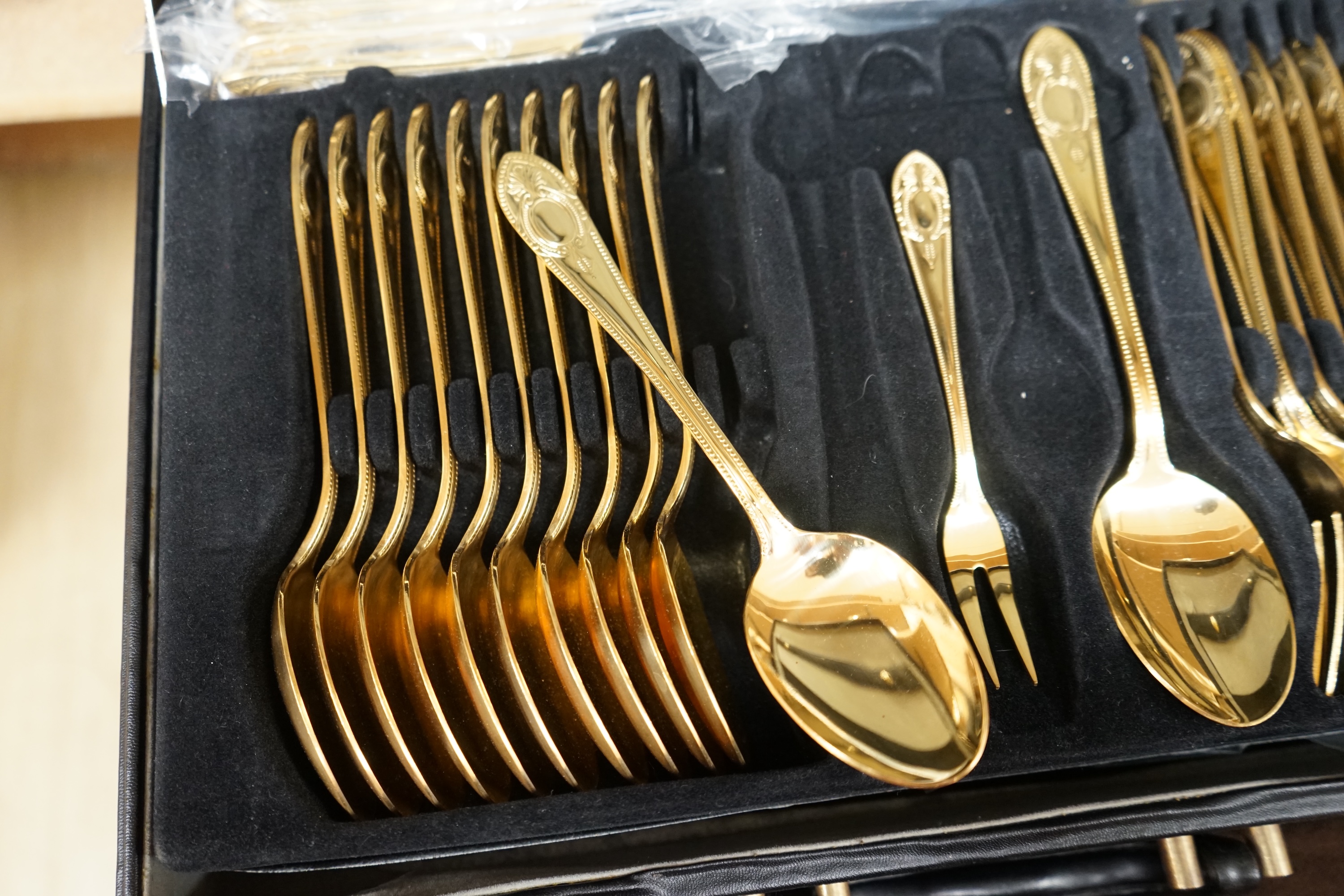 A Bestecke gold plated canteen of cutlery. Condition - good